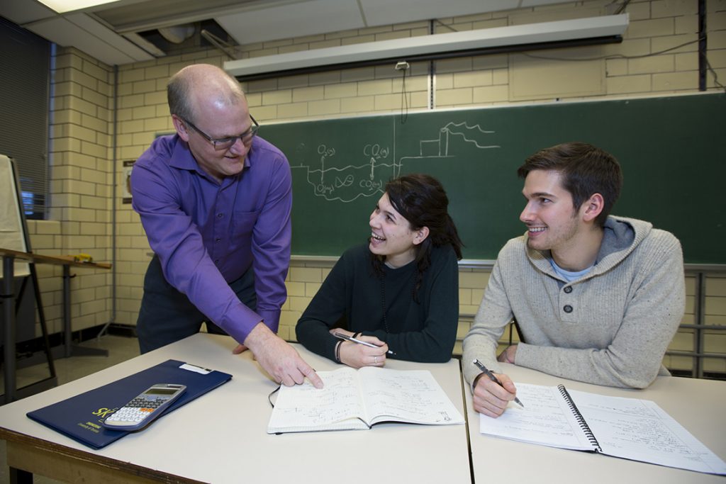 Greg Evans is a professor in the Department of Chemical Engineering and Applied Chemistry. In 2015, he received a President's Teaching Award, which recognizes sustained excellence in teaching, research in teaching, and the integration of teaching and research. His research examines the source and composition of airborne particles, a key pollutant contributing to episodes of poor air quality in large cities.
He is pictured with undergraduate students Nikola Andric and Stephanie Tzanis.