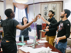 Students building a tower